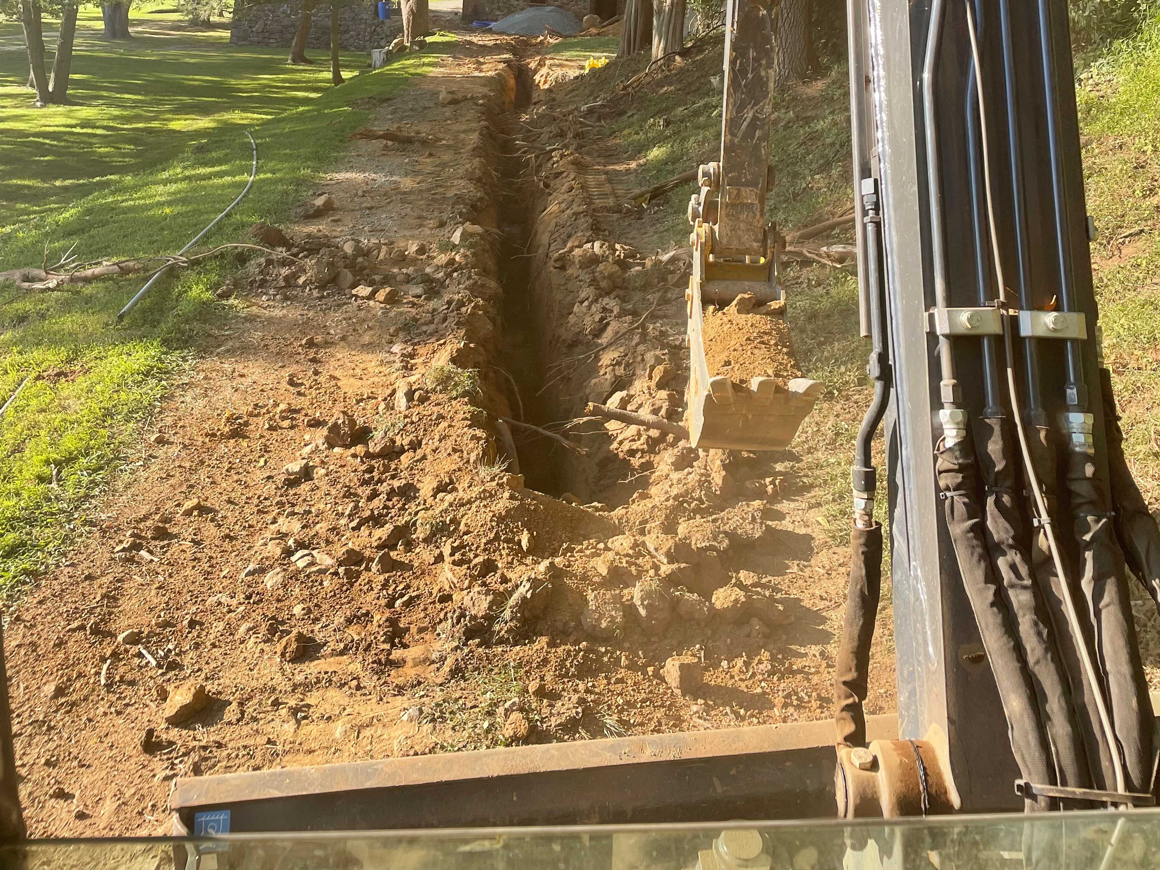 T.A. Industries excavation contractor with excavator in Colonial Hills, PA